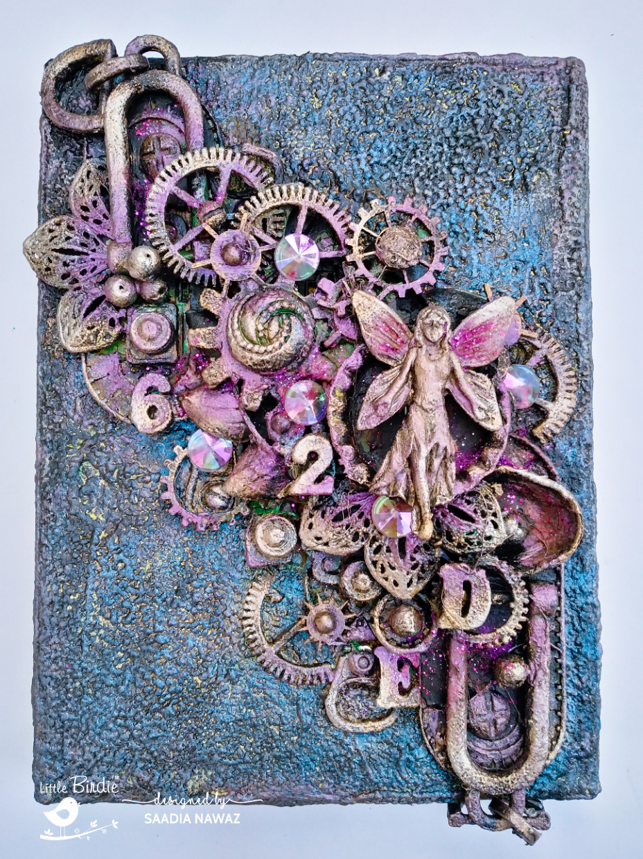 A mixed media project with Embossing texture paste and metallic wax –  Saadia Nawaz